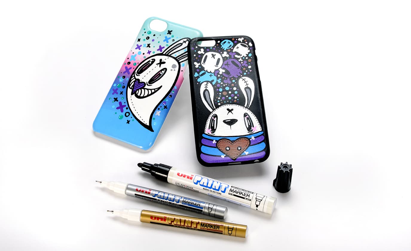 Uni PX-203 bílý lakový popisovač výsledek psaní ukázka